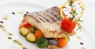 Gebakken heilbotfilet tomaat, courgette, olijfolie extra vergine, tijm, knoflook